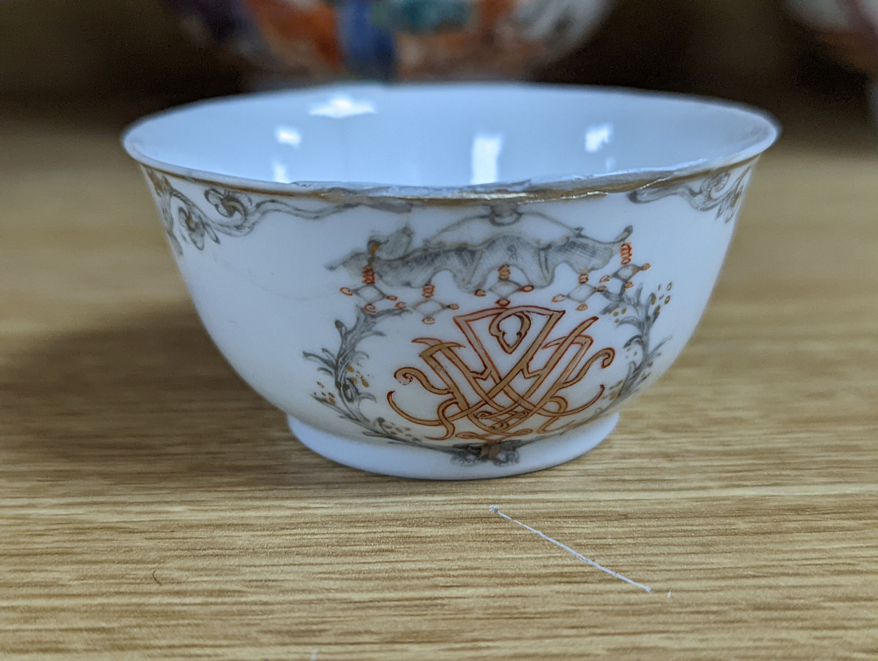 Two 18th century Chinese export bowls, a similar tea bowl and another Chinese blue and white tea bowl, largest 20cm diameter